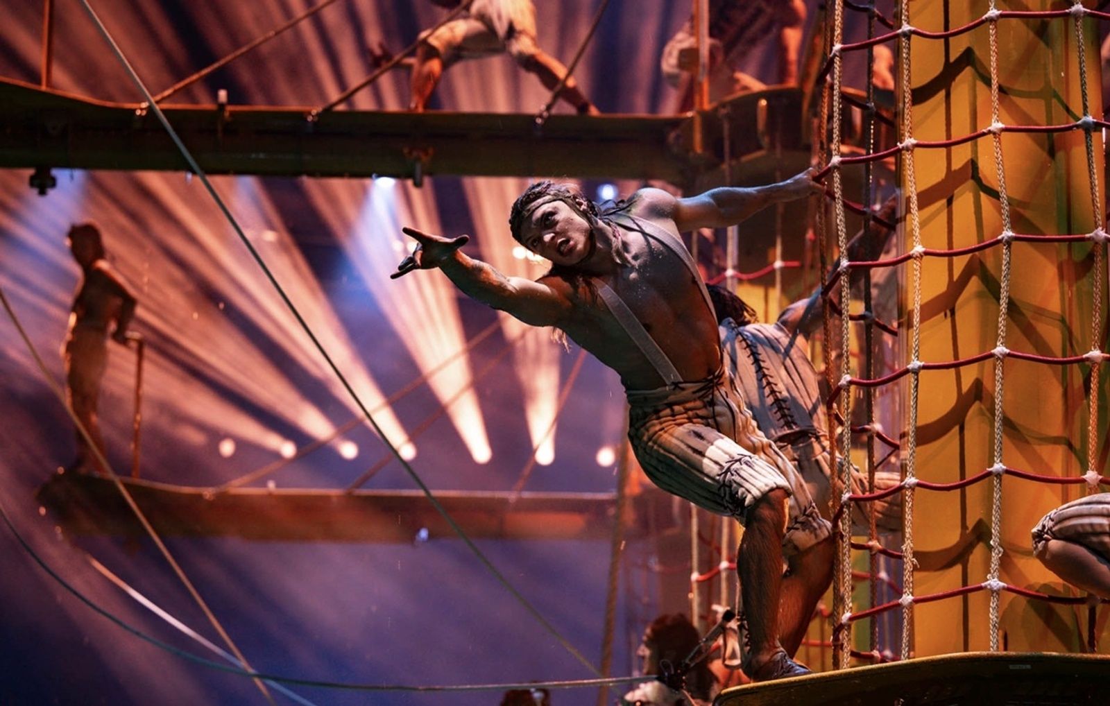 A performer climbs the rope net in The House of Dancing Water, City of Dreams Macau